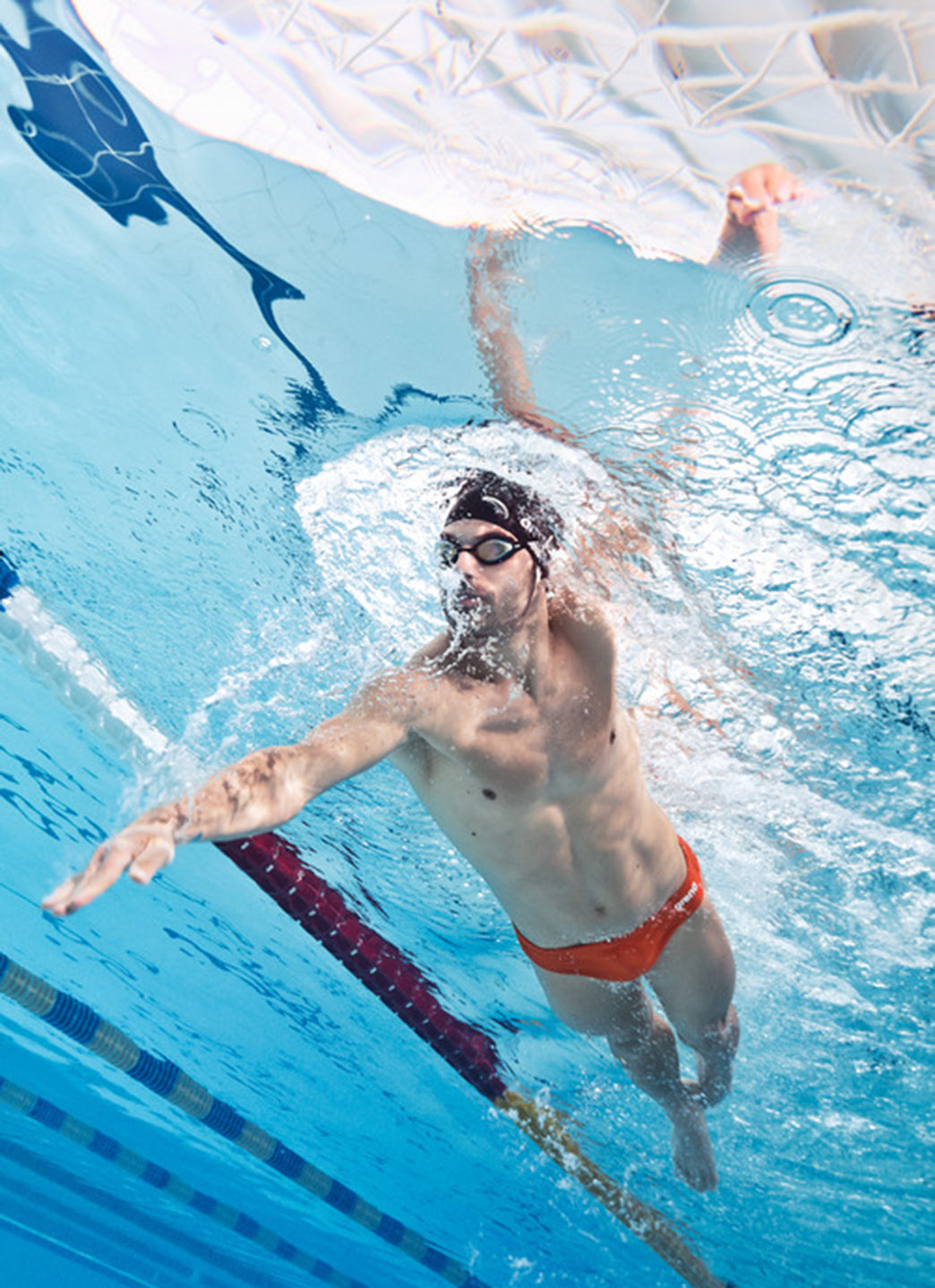 Arena Men's Solid Brief Swimsuit Team Orange