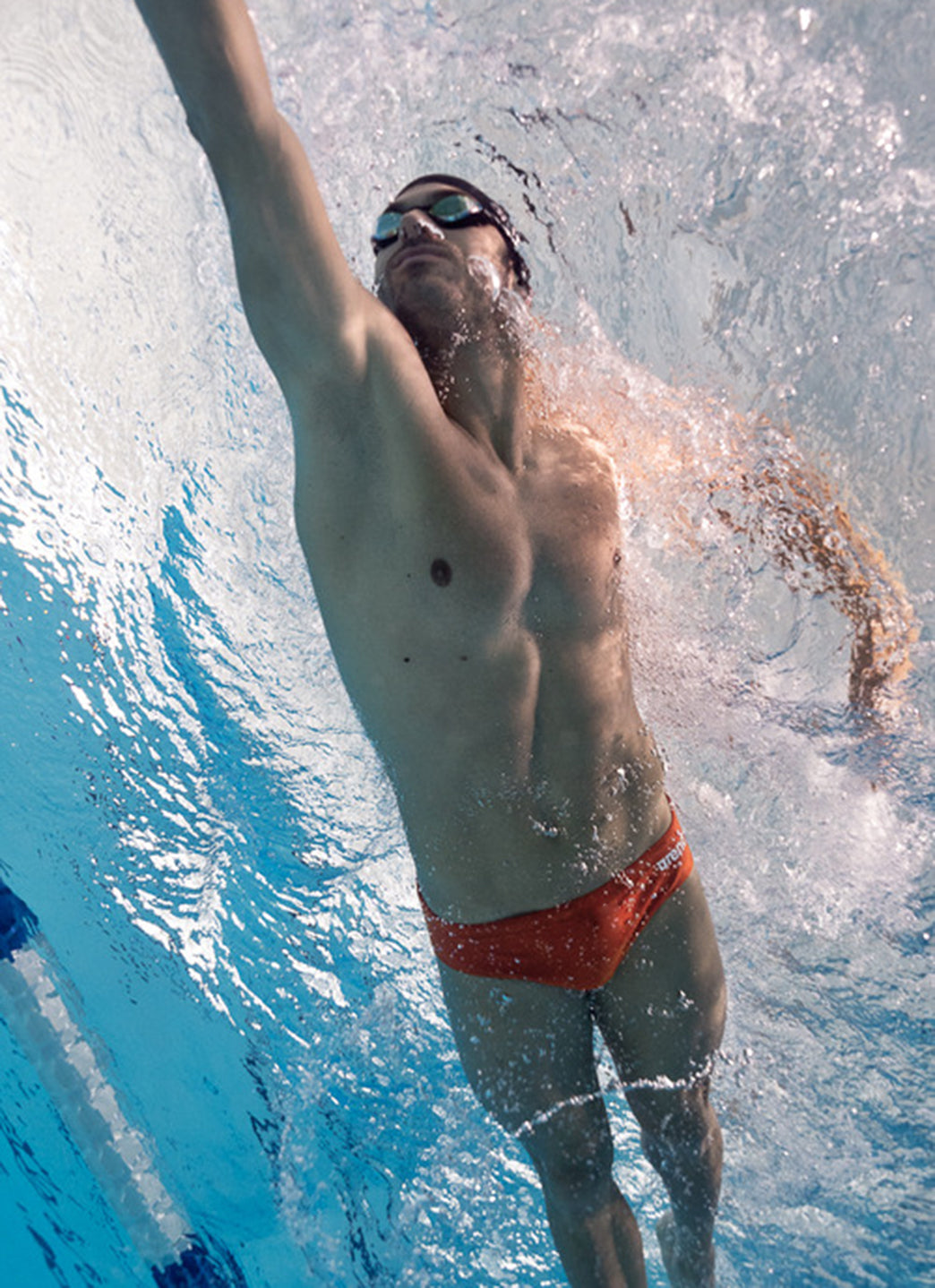 Arena Men's Solid Brief Swimsuit Team Orange